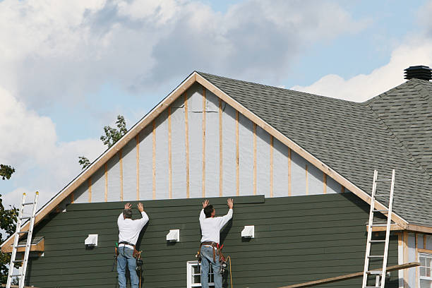 Professional Siding technician working in Lynn, MA